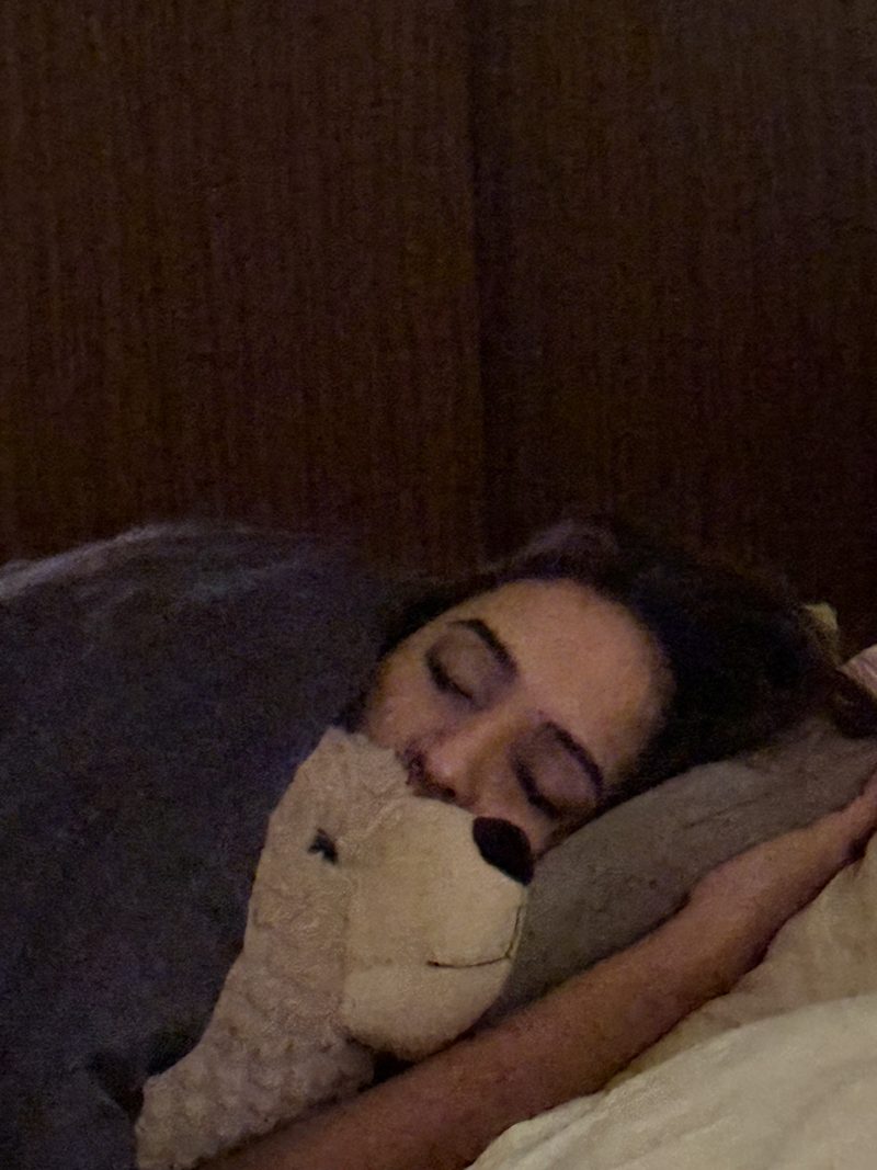 Sleeping with seal stuffed animal